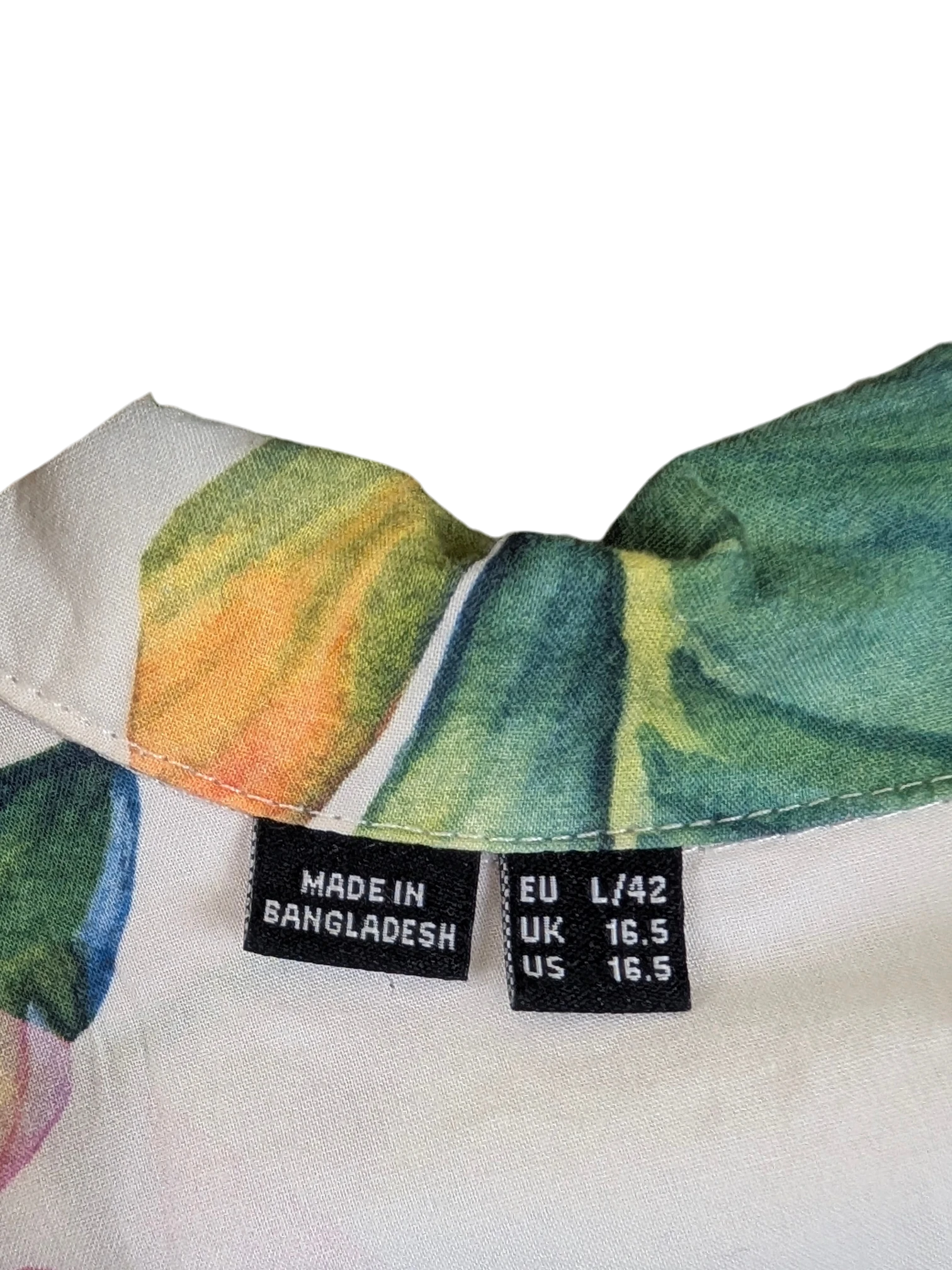 JAKE & IPI Selected Homme Hawaiian shirt featuring a white base with green and orange tropical leaf print