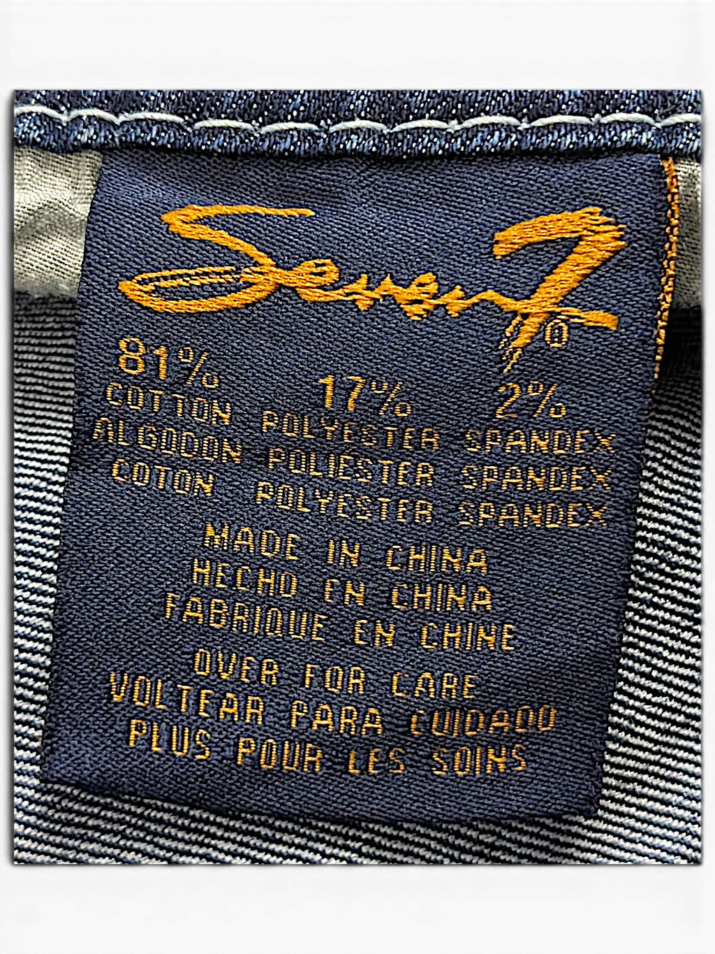 JAKE & IPI Seven7 capri jeans clothing label showing 81 percent cotton, 17 percent polyester, and 2 percent spandex.