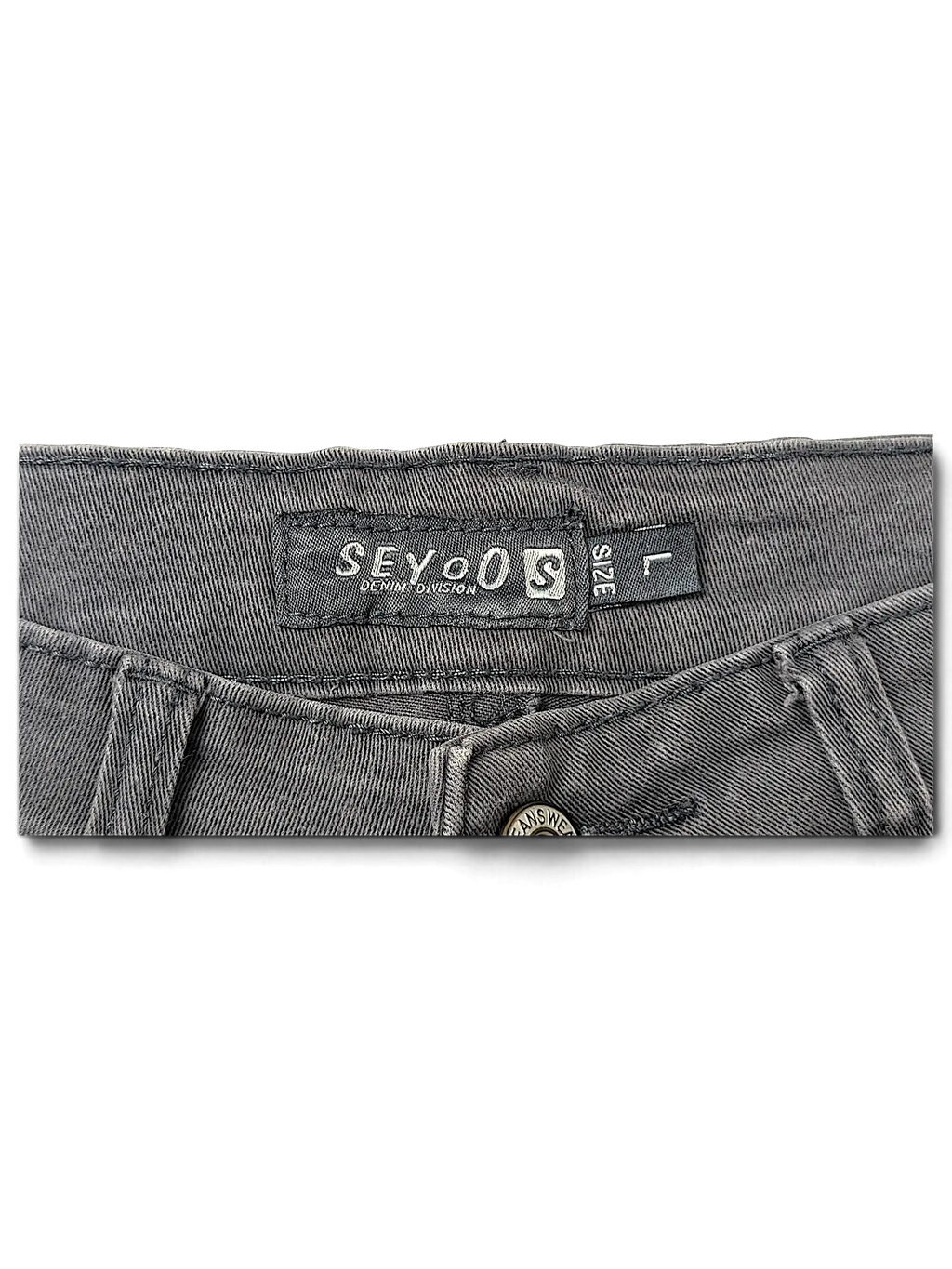 JAKE & IPI Seyoo Denim Division Y2K jeans featuring a black fabric label and size L tag on the waistband