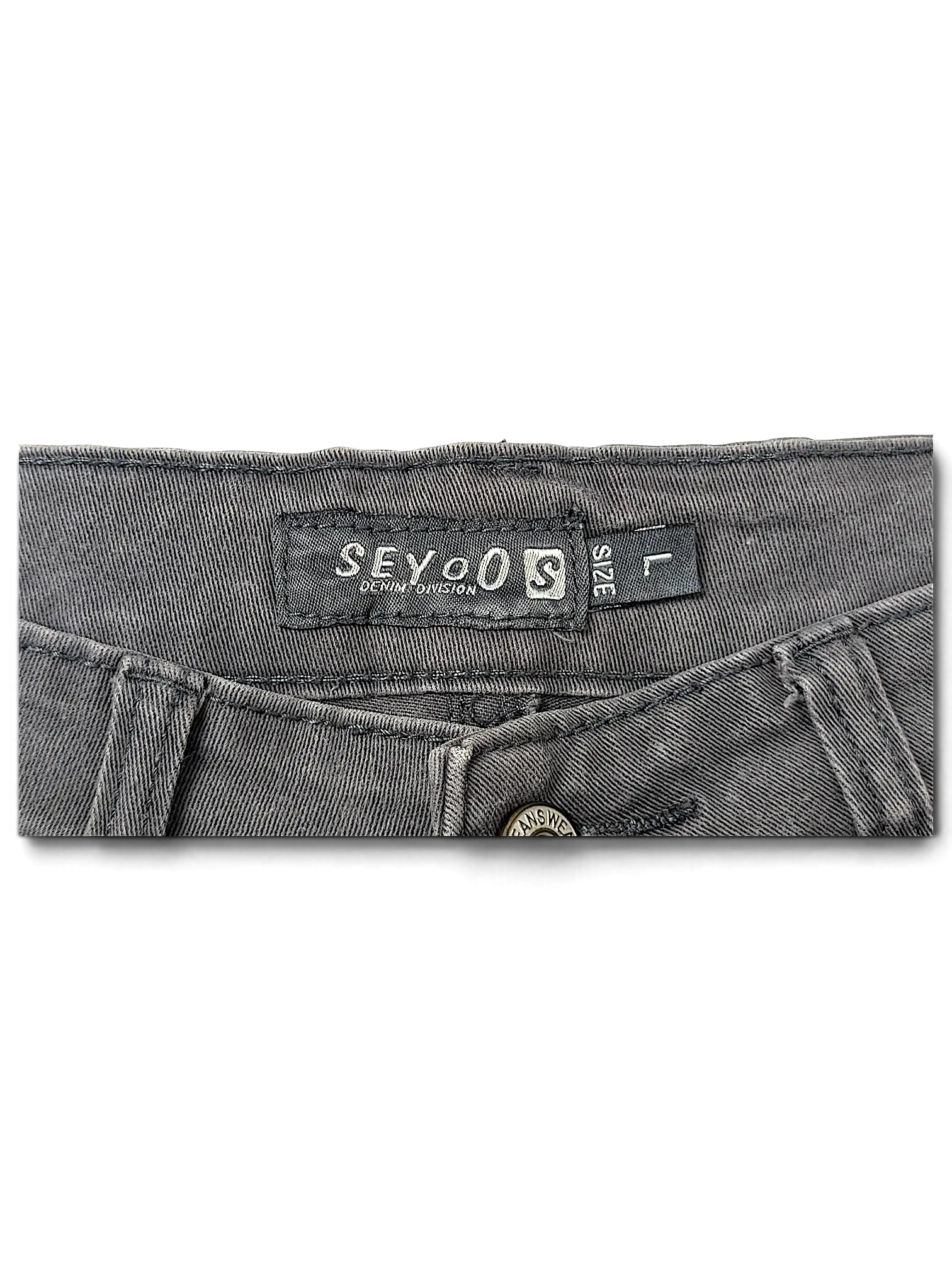 JAKE & IPI Seyoo Denim Division Y2K jeans featuring a black fabric label and size L tag on the waistband