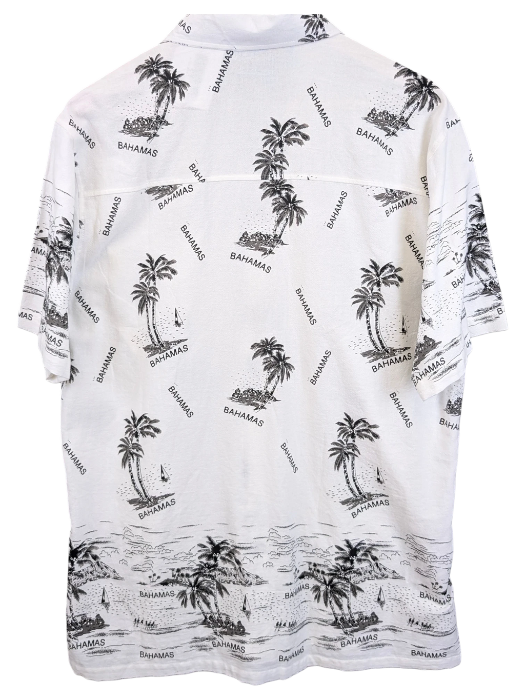 JAKE & IPI Shoreline Hawaiian shirt in white with a black tropical palm tree and Bahamas print on the back