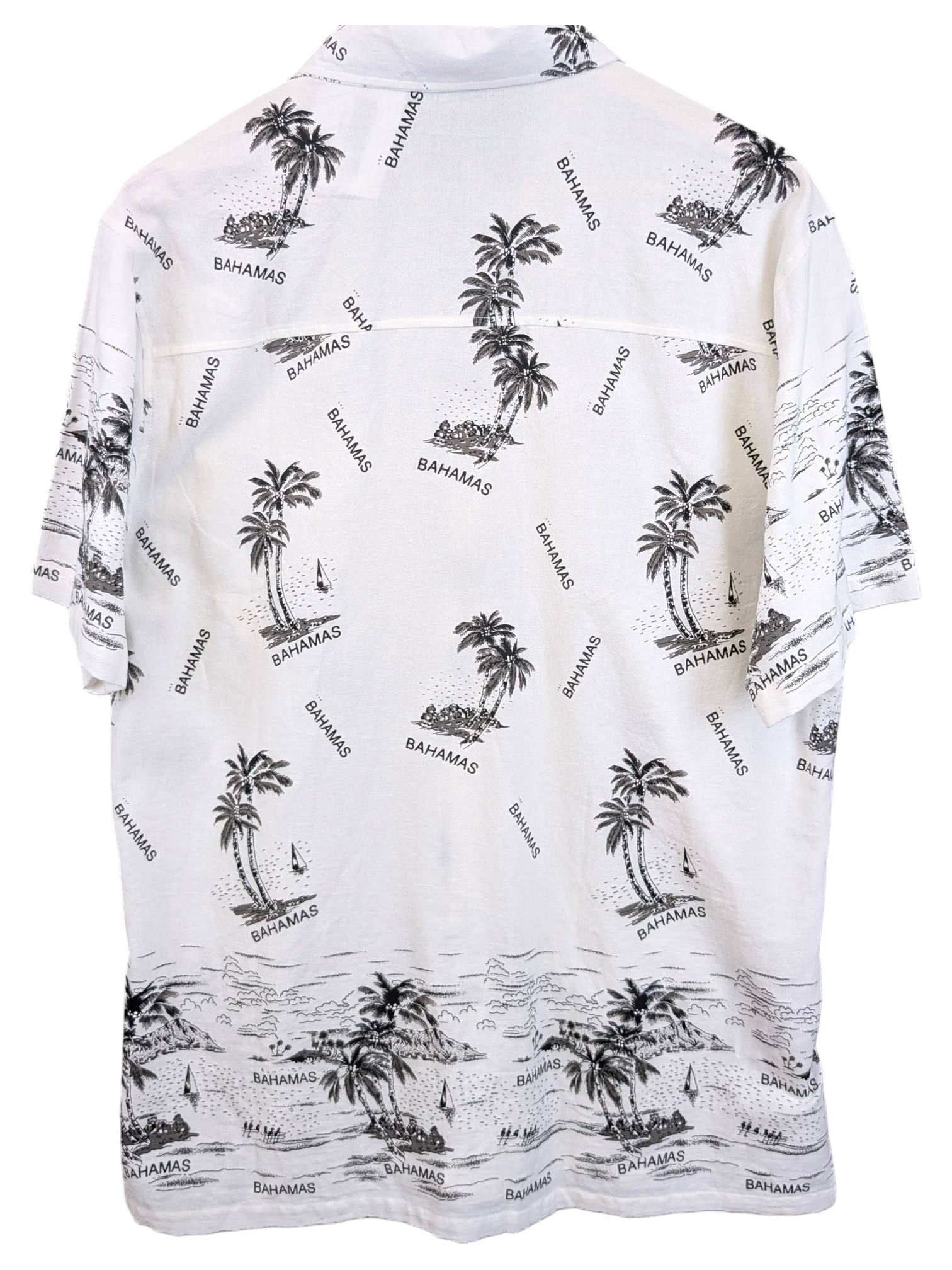 JAKE & IPI Shoreline Hawaiian shirt in white with a black tropical palm tree and Bahamas print on the back
