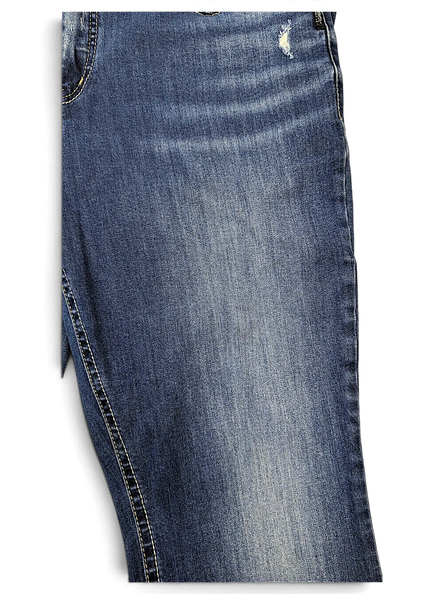 JAKE & IPI Silver Jeans Co Elyse slim boot jeans in medium wash denim with distressed detailing and contrast stitching