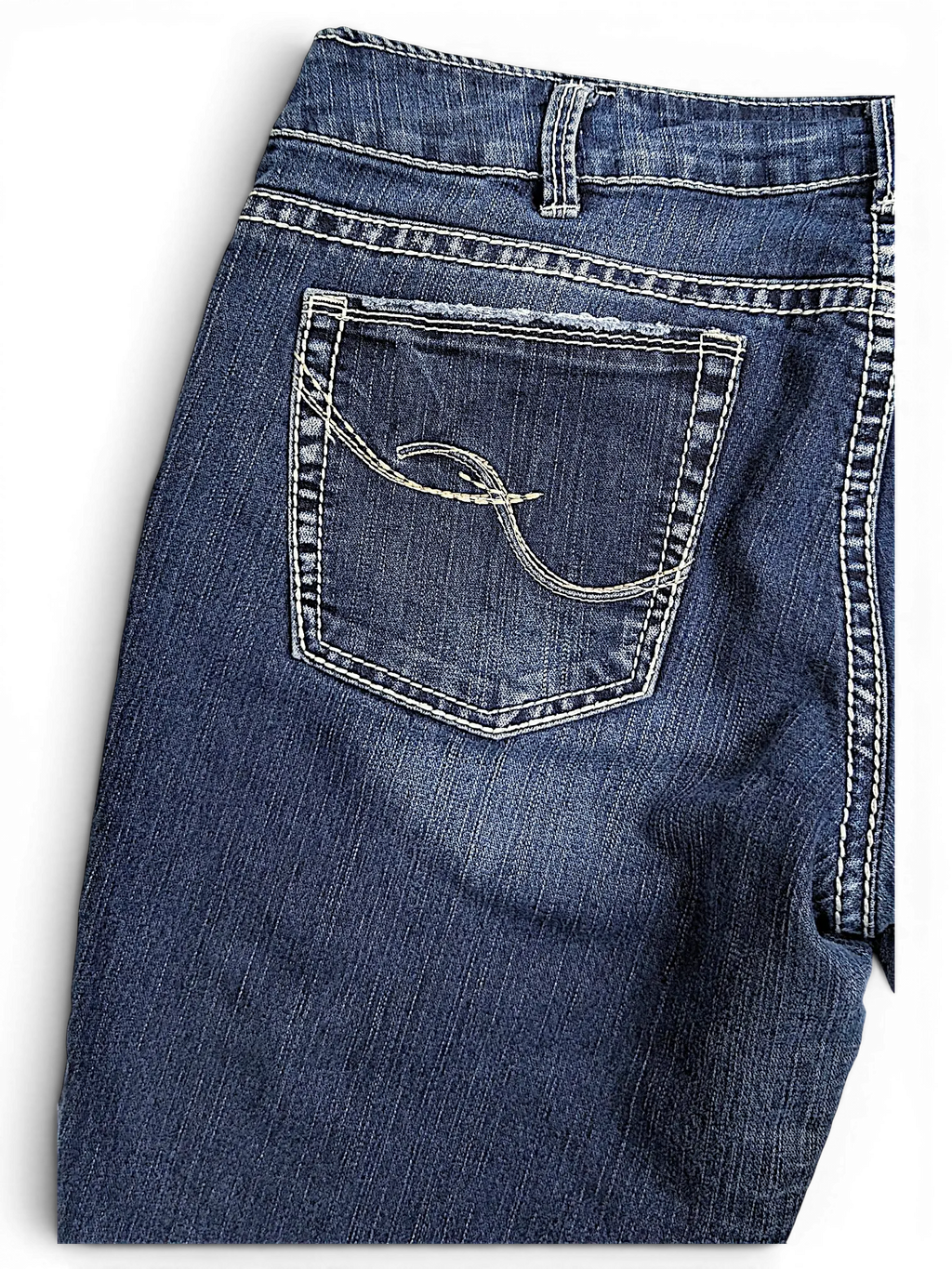 JAKE & IPI Silver Jeans Suki capri denim pants featuring dark wash fabric and decorative back pocket stitching.