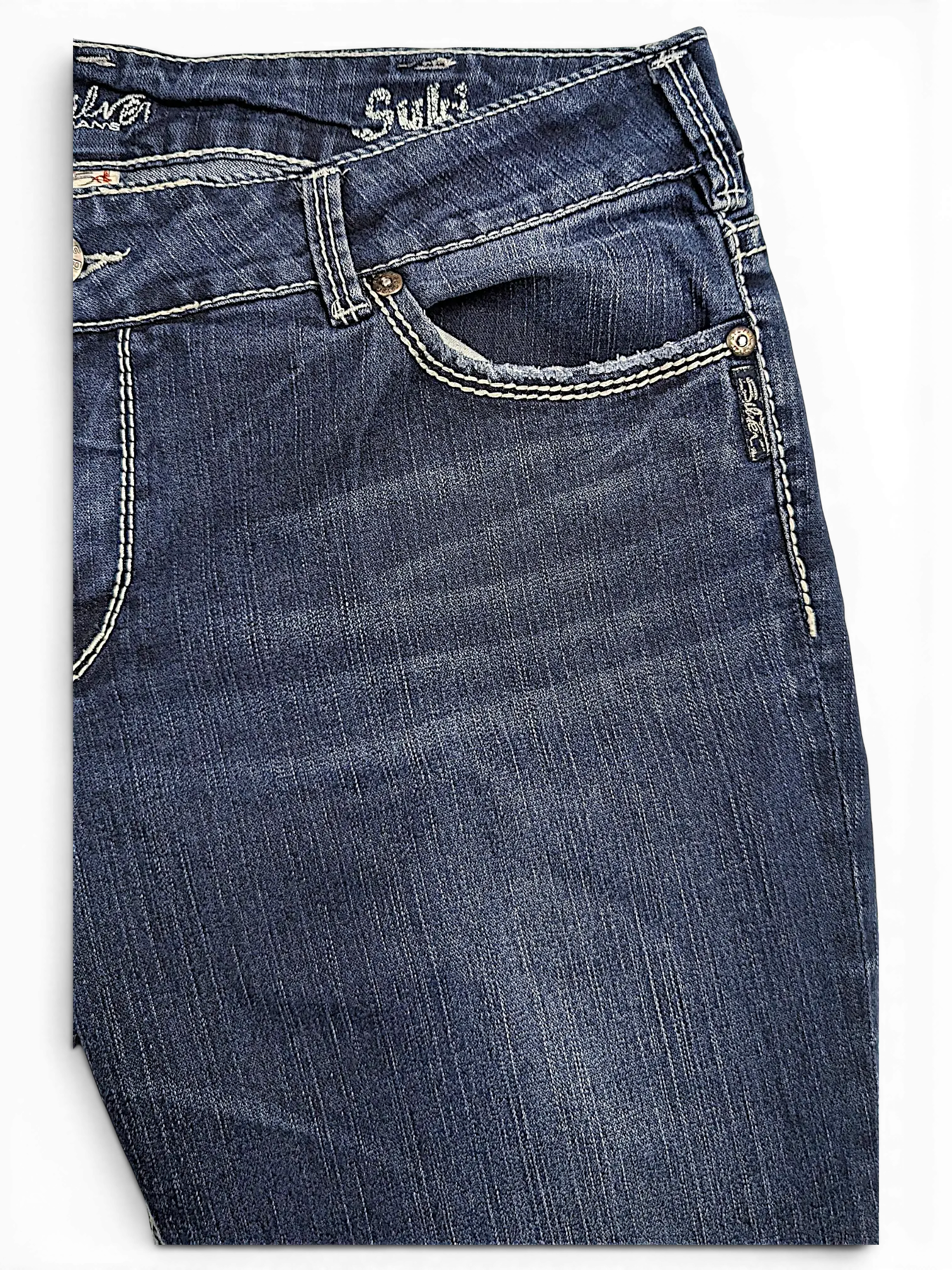 JAKE & IPI Silver Jeans Suki capri pants in dark wash denim with contrast stitching and silver hardware details.