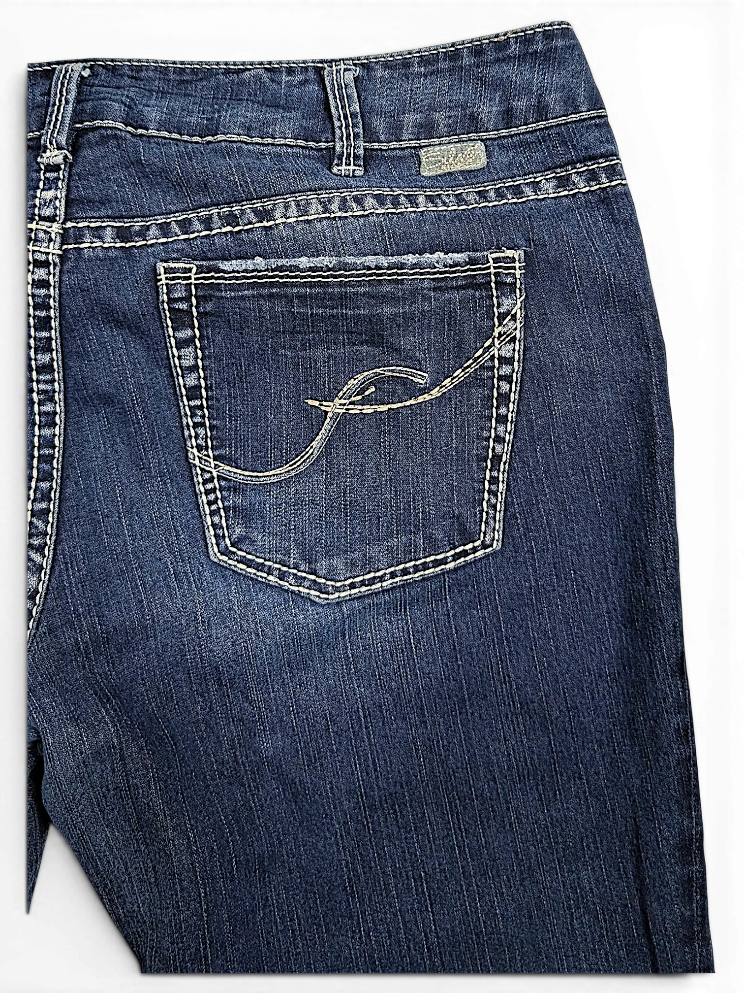 JAKE & IPI Silver Jeans Suki capri pants in dark wash denim with contrast stitching and embroidered back pocket
