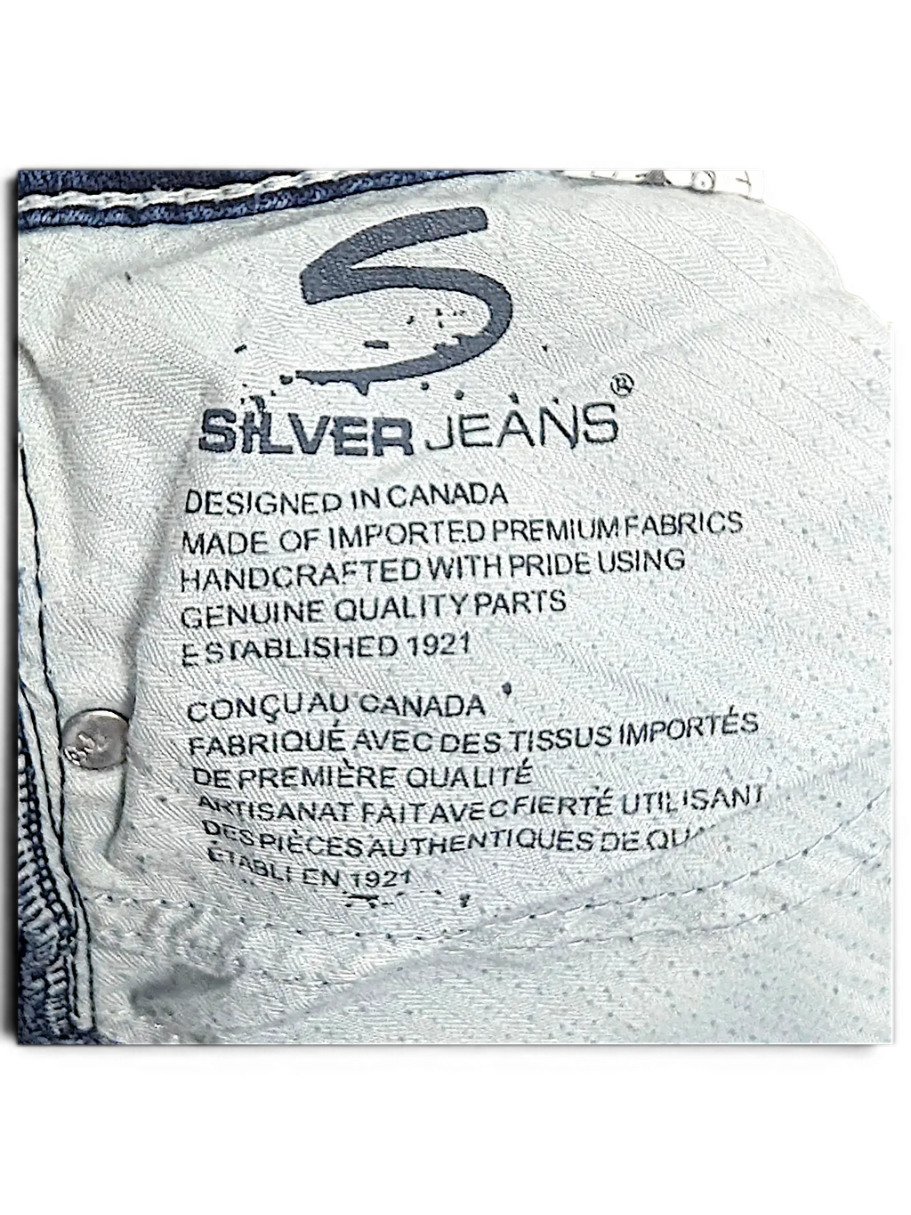 JAKE & IPI Silver Jeans Suki capri interior label showing brand logo and fabric composition details