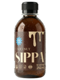 JAKE & IPI SIPPA Choconut chocolate hazelnut syrup bottle with condensation on a white background