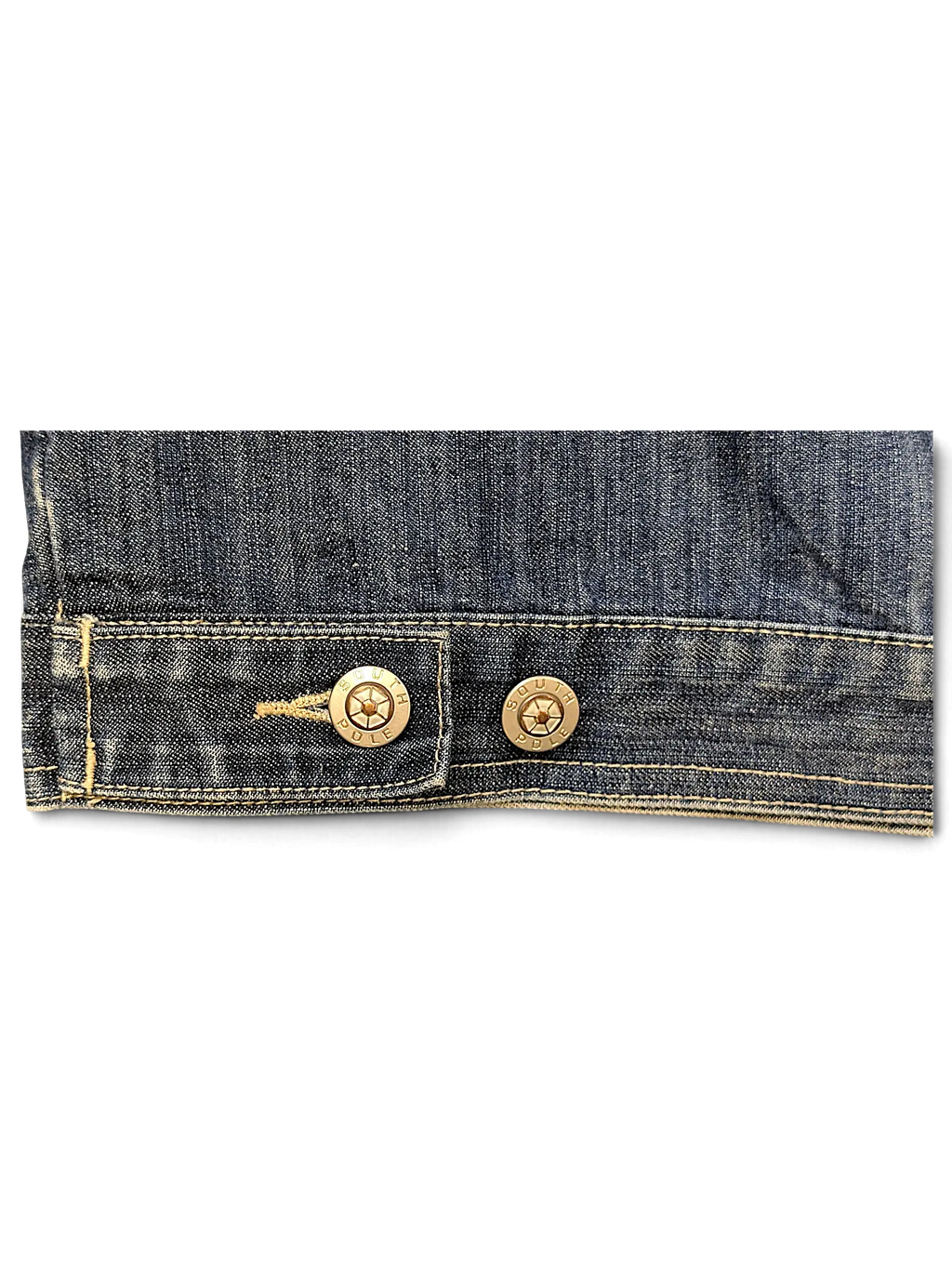 Close-up of a JAKE & IPI Southpole denim jacket featuring dark blue fabric and branded metallic buttons