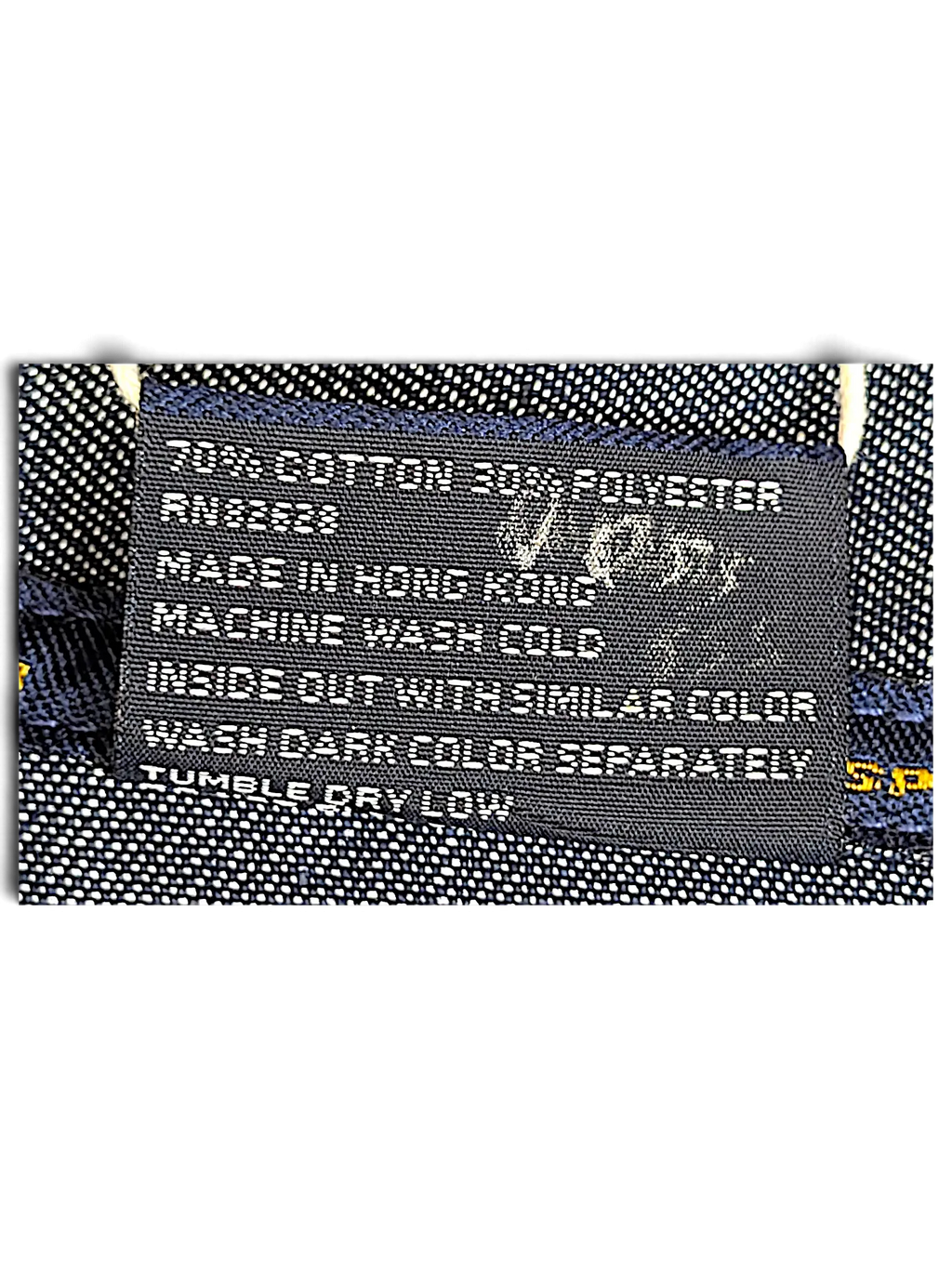JAKE & IPI Southpole denim jacket interior care label with size XL and cotton polyester blend details