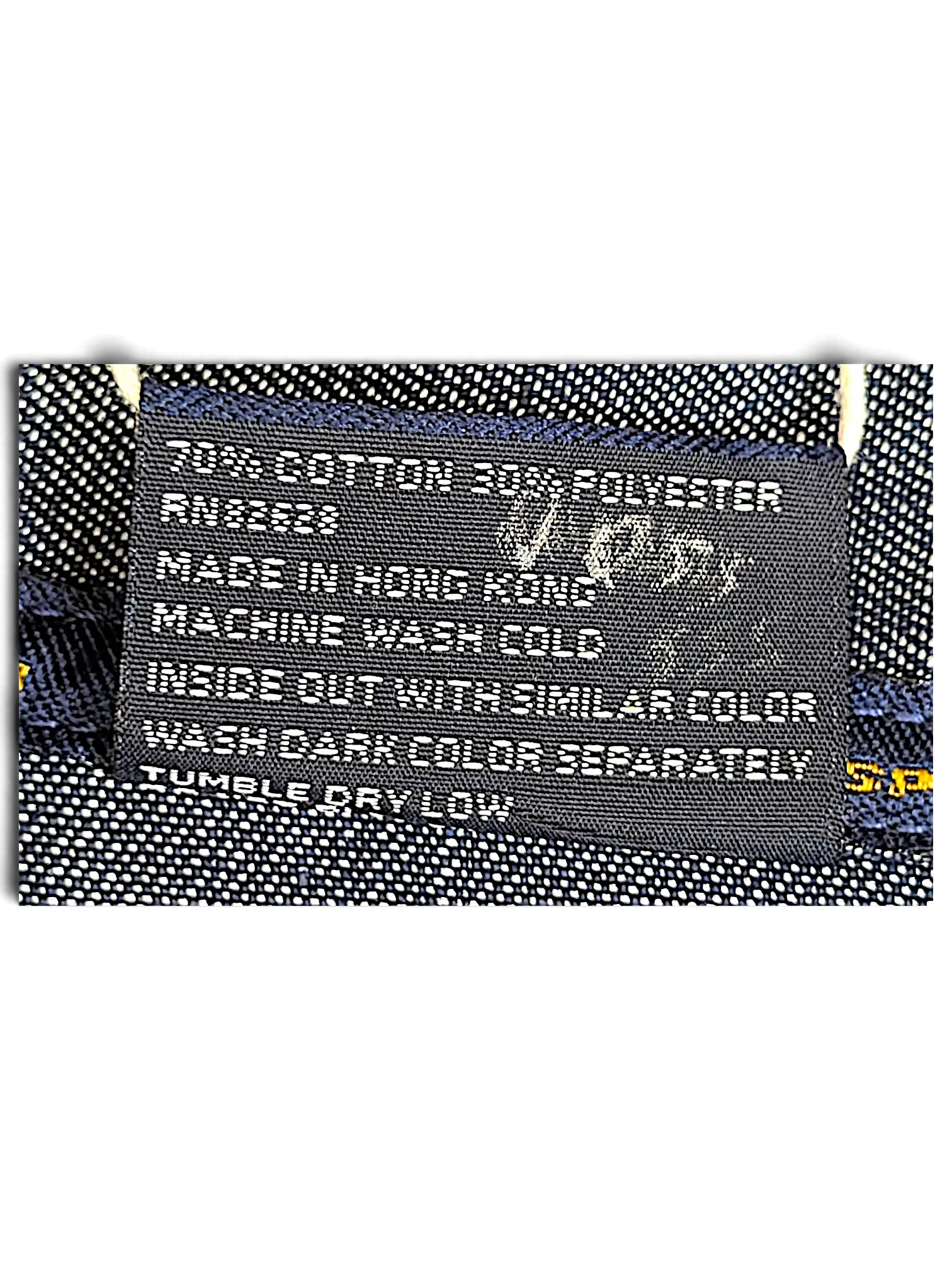 JAKE & IPI Southpole denim jacket interior care label with size XL and cotton polyester blend details