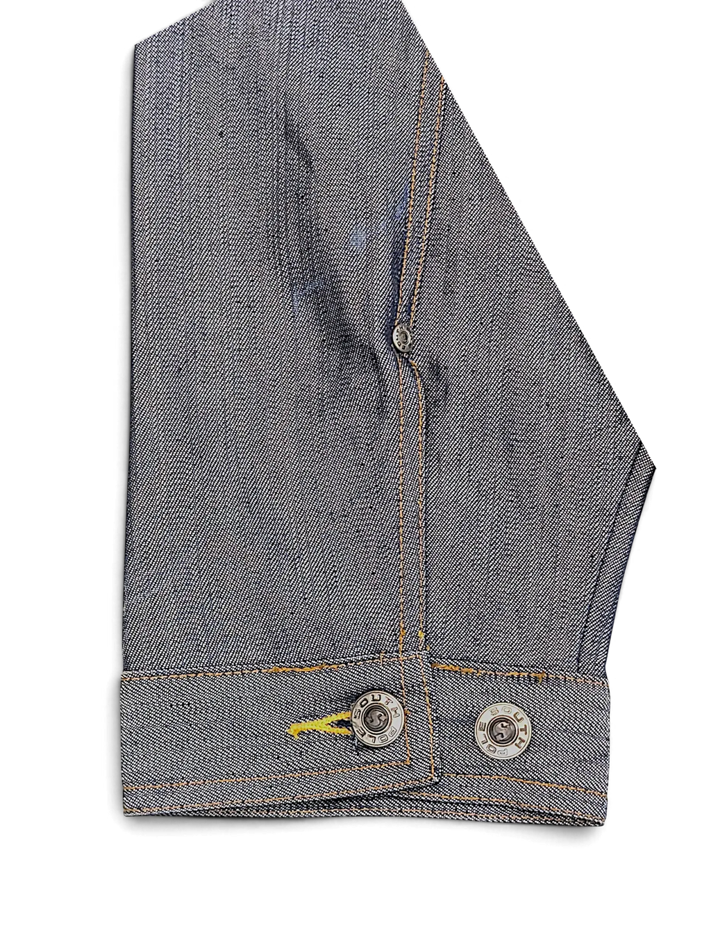 JAKE & IPI Southpole denim jacket sleeve with branded metal buttons and yellow stitching detail