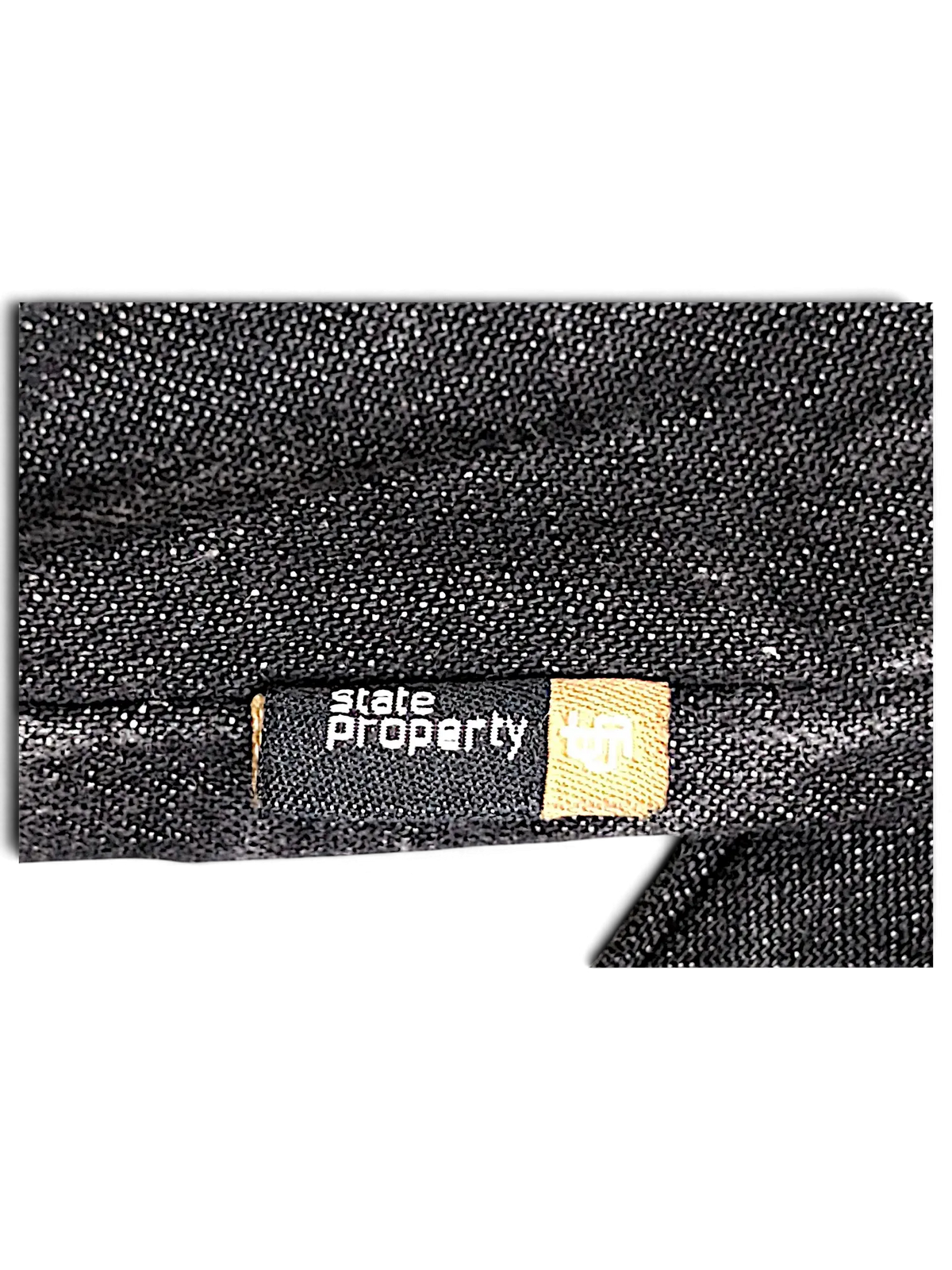 JAKE & IPI State Property dark wash denim work jacket featuring a branded fabric label on the sleeve