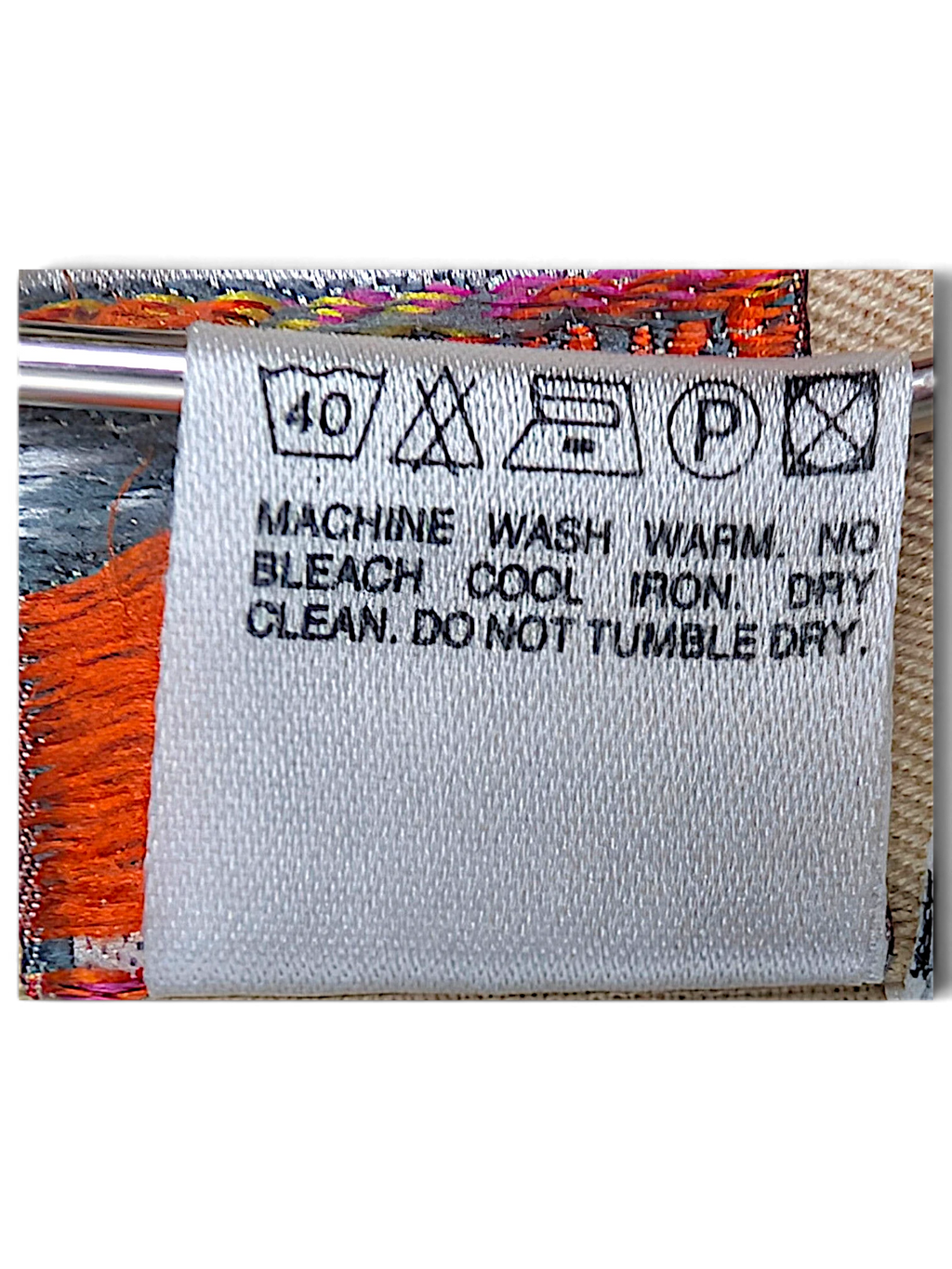 JAKE & IPI Stefanel trousers care label with washing instructions and fabric composition details