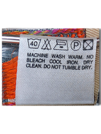 JAKE & IPI Stefanel trousers care label with washing instructions and fabric composition details