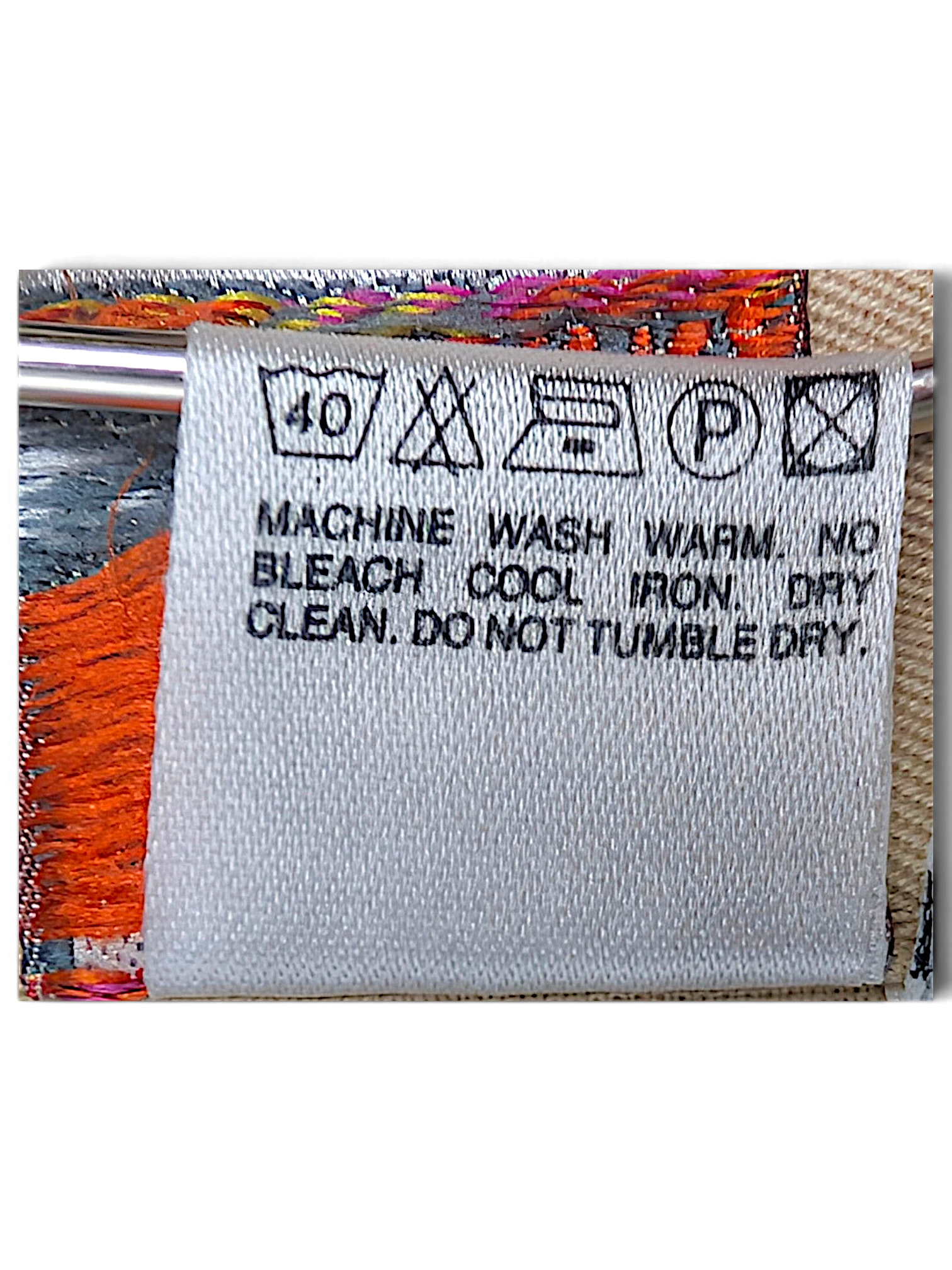 JAKE & IPI Stefanel trousers care label with washing instructions and fabric composition details
