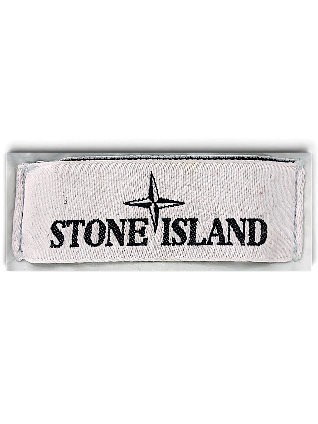 Stone Island compass logo label inside pale blue down coat