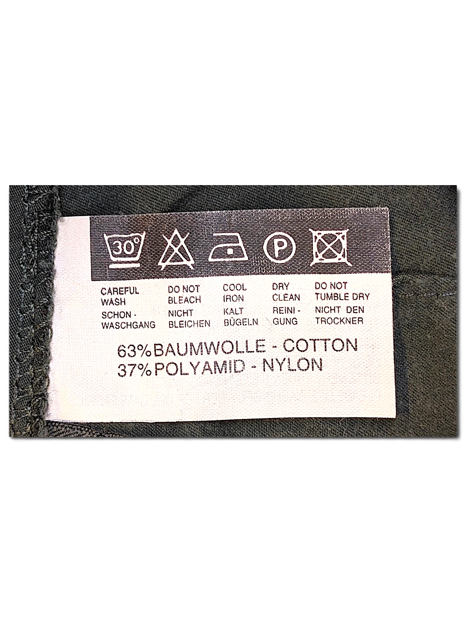 JAKE & IPI Street One joggers care label showing 63 percent cotton and 37 percent nylon composition with wash symbols