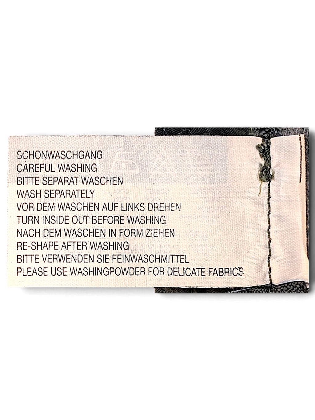 JAKE & IPI Street One Ricco joggers care label with washing instructions in German and English