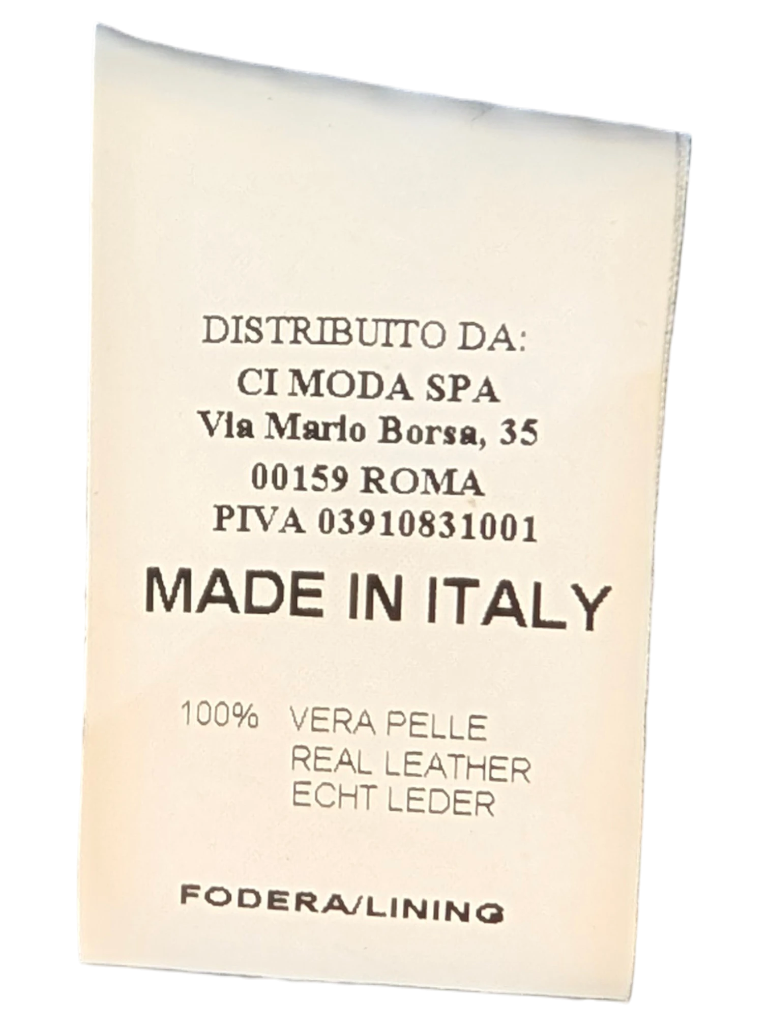 JAKE & IPI Compagnia Italiana suede leather pants interior label showing Made in Italy and 100% real leather details