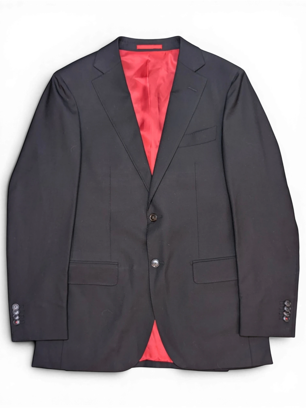 JAKE & IPI Suitsupply black suit jacket with a vibrant red silk lining and two-button front closure