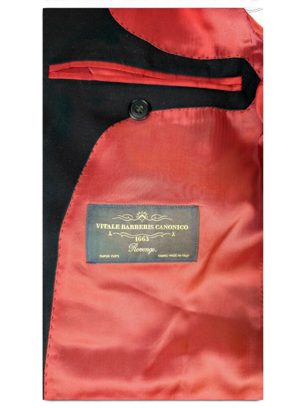 JAKE & IPI Suitsupply suit interior featuring a deep red lining and Vitale Barberis Canonico Super 150s wool label