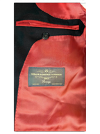 JAKE & IPI Suitsupply suit interior featuring a deep red lining and Vitale Barberis Canonico Super 150s wool label