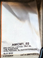 JAKE & IPI Superdry College garment care label with white fabric and black text detailing manufacturer information