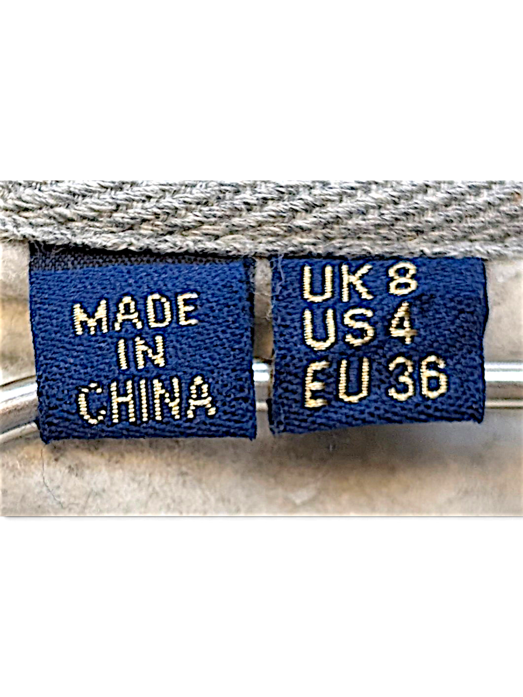 JAKE & IPI Superdry College sweatshirt interior neck labels showing size UK 8, US 4, EU 36 and country of origin