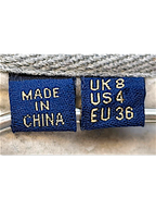 JAKE & IPI Superdry College sweatshirt interior neck labels showing size UK 8, US 4, EU 36 and country of origin