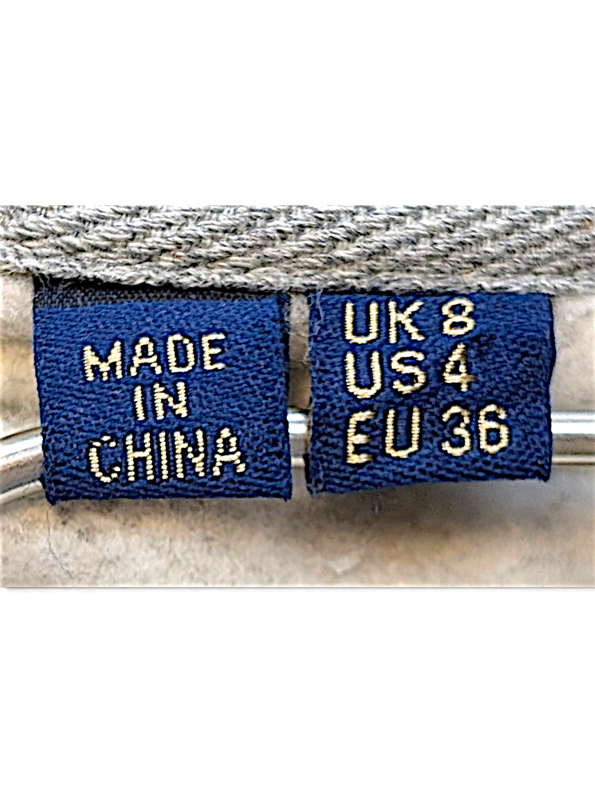 JAKE & IPI Superdry College sweatshirt interior neck labels showing size UK 8, US 4, EU 36 and country of origin