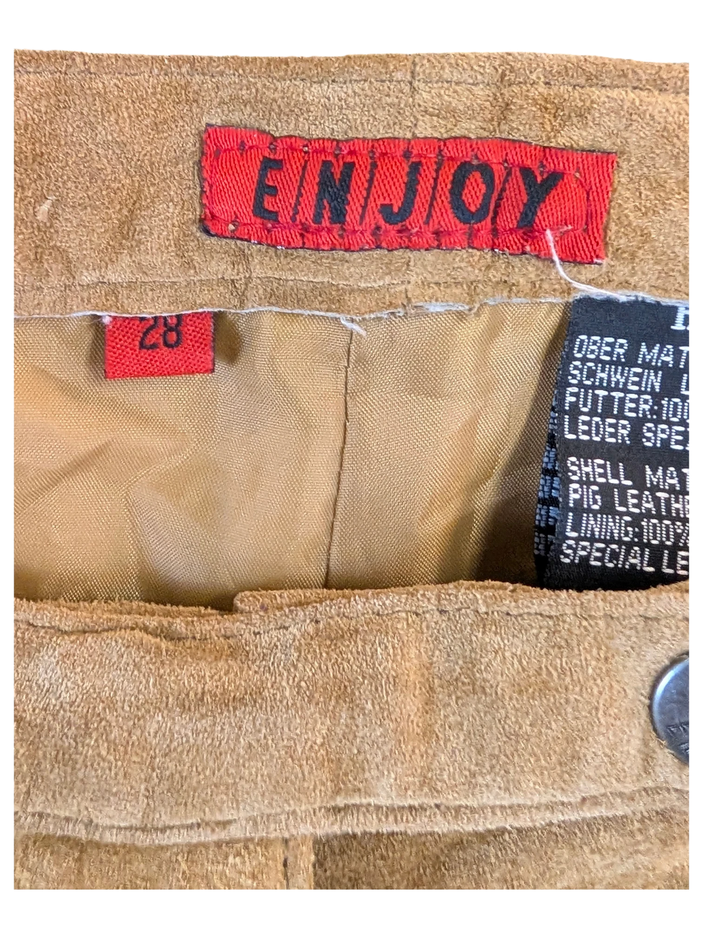 JAKE & IPI Enjoy tan suede leather pants interior label showing size 28 and pig leather material details