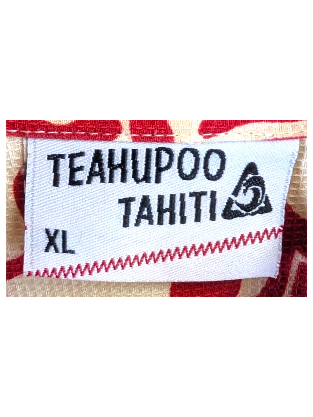 JAKE & IPI Teahupoo Tahiti Hawaiian shirt featuring a red and cream floral pattern with a textured waffle fabric.