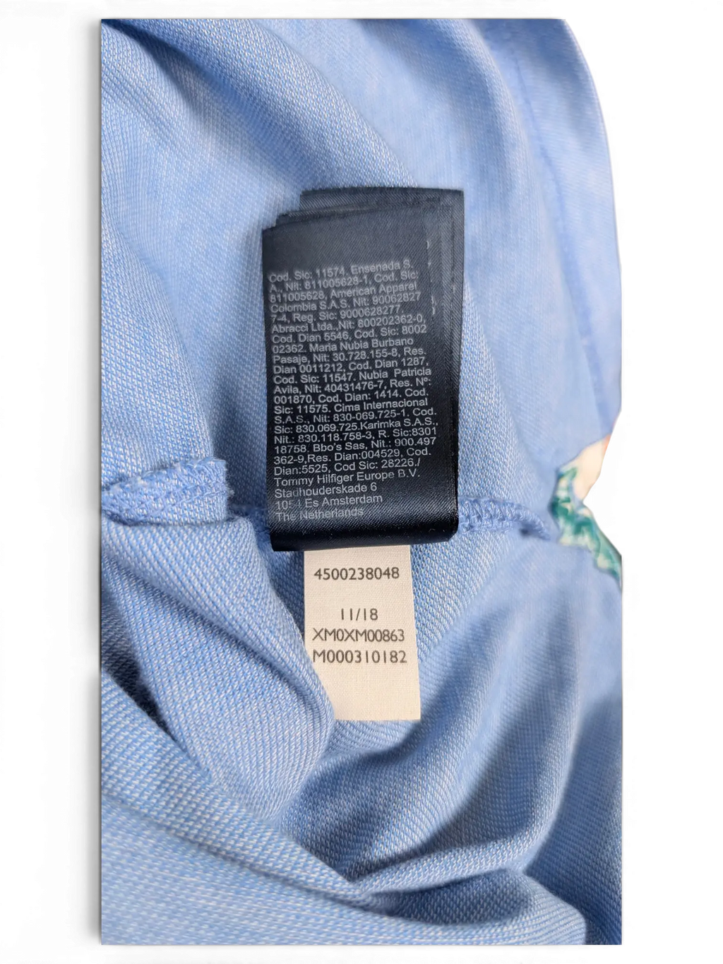 JAKE & IPI Tommy Hilfiger light blue polo shirt interior care and manufacturing label detail