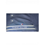 JAKE & IPI käytetty tummansininen Tommy Hilfiger -pikeepaita valkoisilla paspeleilla, logotekstillä ja lippulogolla.