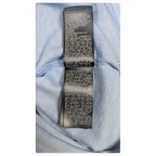 JAKE & IPI Tommy Hilfiger vaaleansinisen pikeepaidan hoito-ohjelappu merkki- ja valmistustietoineen