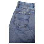 JAKE & IPI Tommy Jeans blue denim with classic five-pocket construction and distressed back pocket detail
