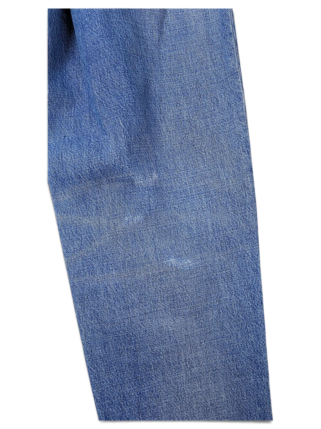 JAKE & IPI Tommy Jeans blue denim fabric texture with classic five-pocket construction detail