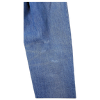 JAKE & IPI Tommy Jeans blue denim fabric texture with classic five-pocket construction detail
