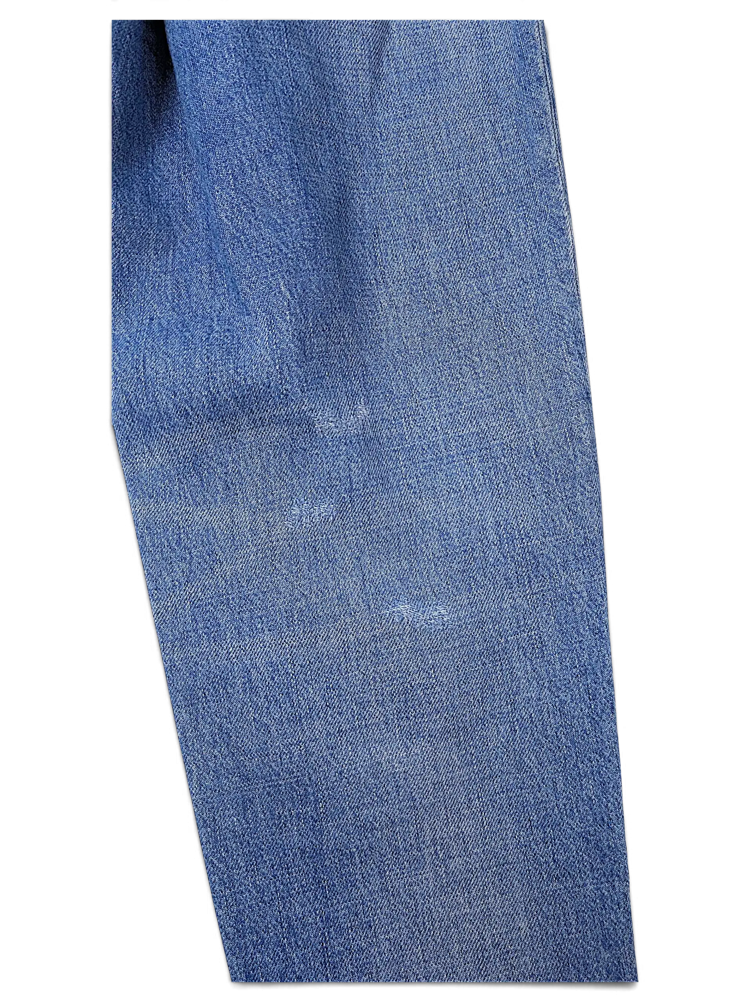 JAKE & IPI Tommy Jeans blue denim fabric texture with classic five-pocket construction detail