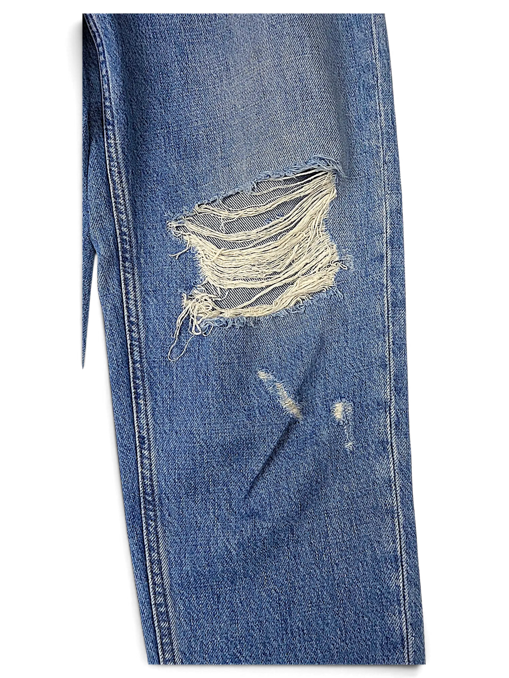 JAKE & IPI Tommy Jeans blue denim with distressed knee detail and classic five-pocket construction.
