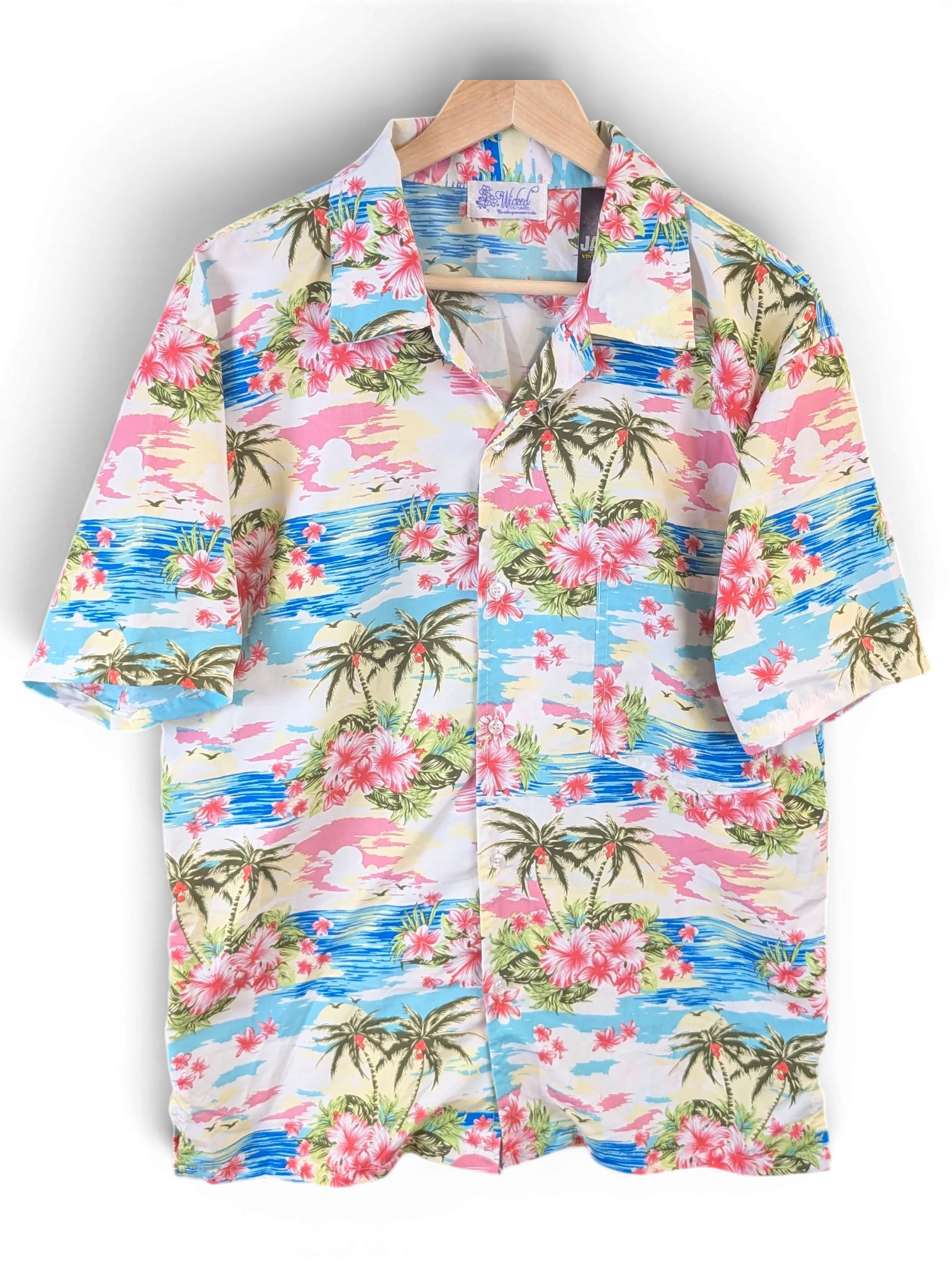 JAKE & IPI short-sleeve Hawaiian shirt featuring a tropical beach print with palm trees and pink hibiscus flowers.