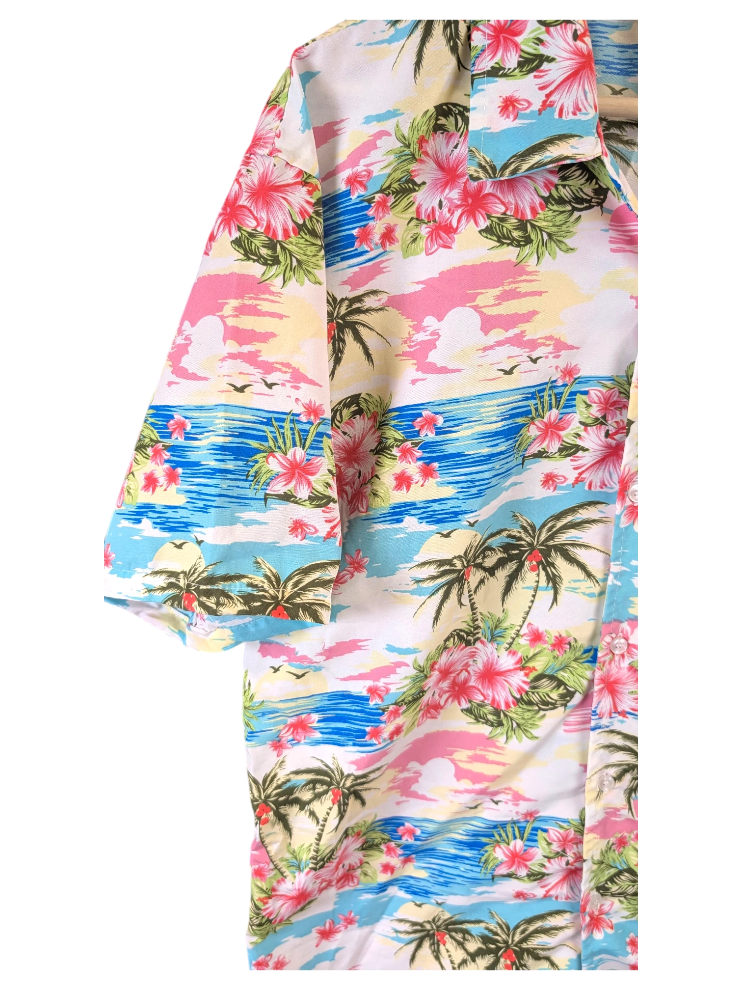 JAKE & IPI Hawaiian shirt featuring a vibrant tropical beach print with palm trees, hibiscus flowers, and sunset sky.