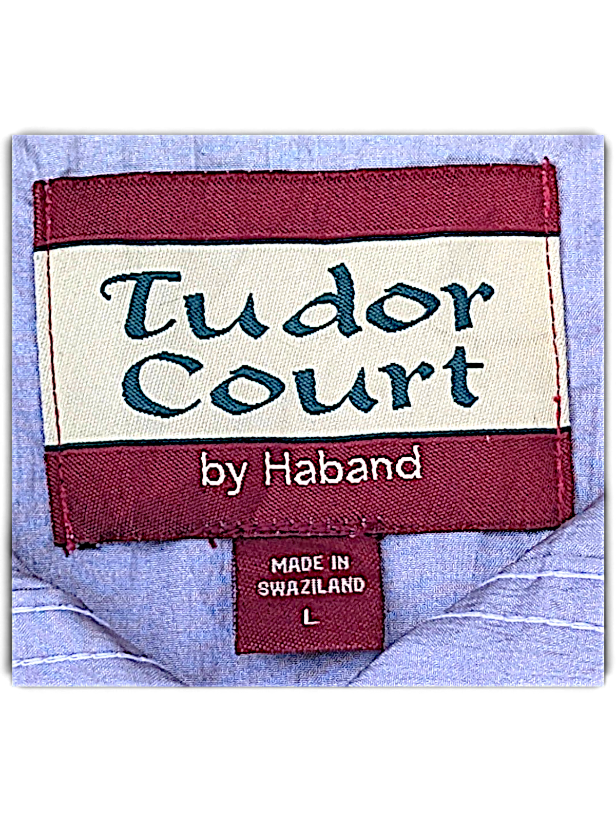 Tudor Court Lilac Snap Front Jacket; Lilac collar and snap front detail.