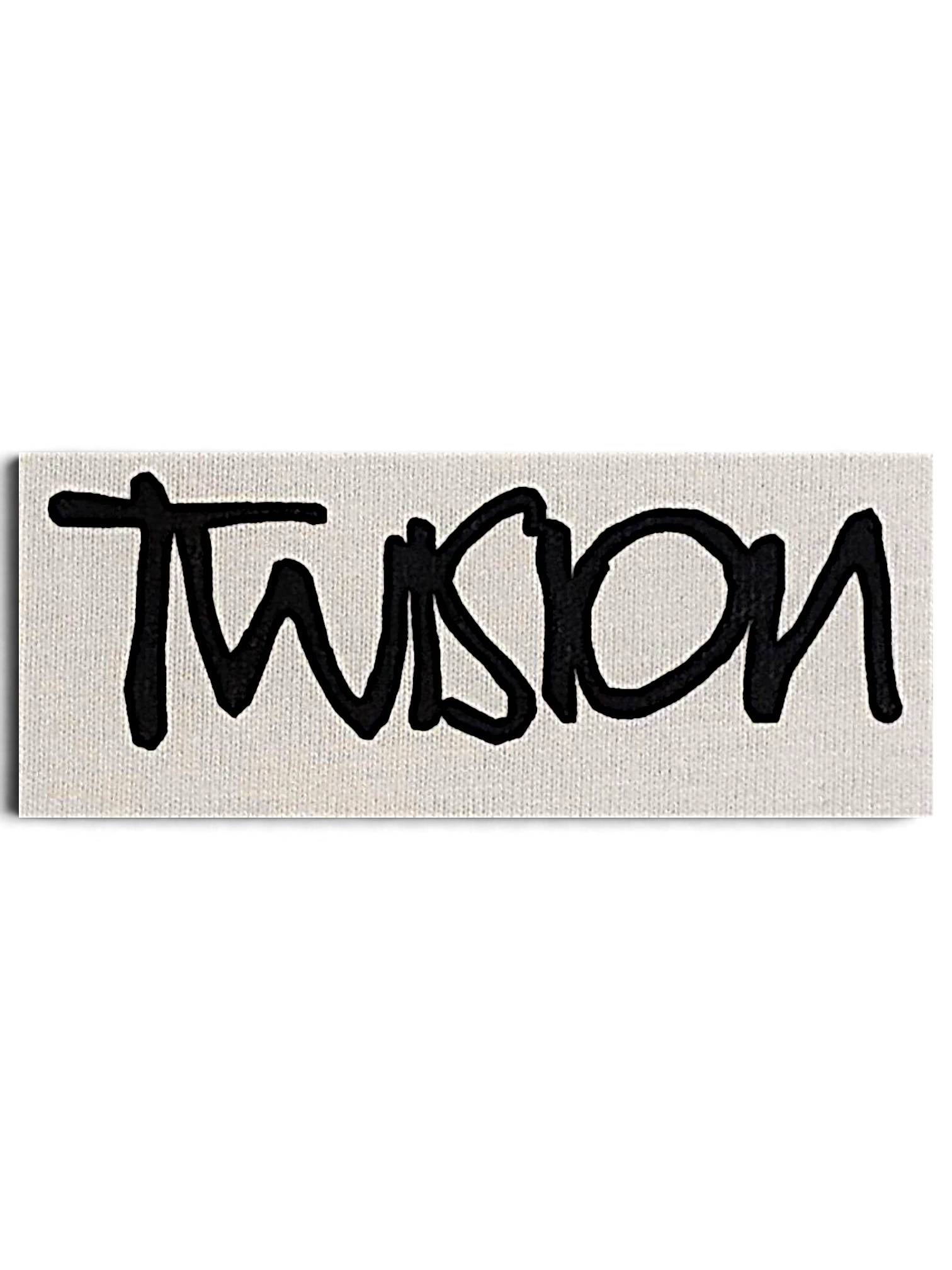 JAKE & IPI Twision T-Shirt featuring a black hand-drawn style logo on a cream fabric background