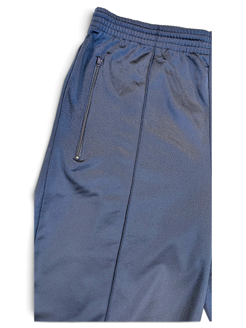 JAKE & IPI pre-owned navy Umbro track pants featuring an elasticated waistband and a zippered side pocket.