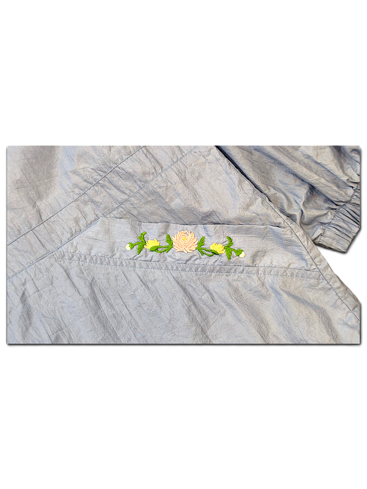 Blair Light Blue Floral Embroidered Longline Windbreaker – M; detail view showing fabric, construction, label or condition (image 3 of 7).