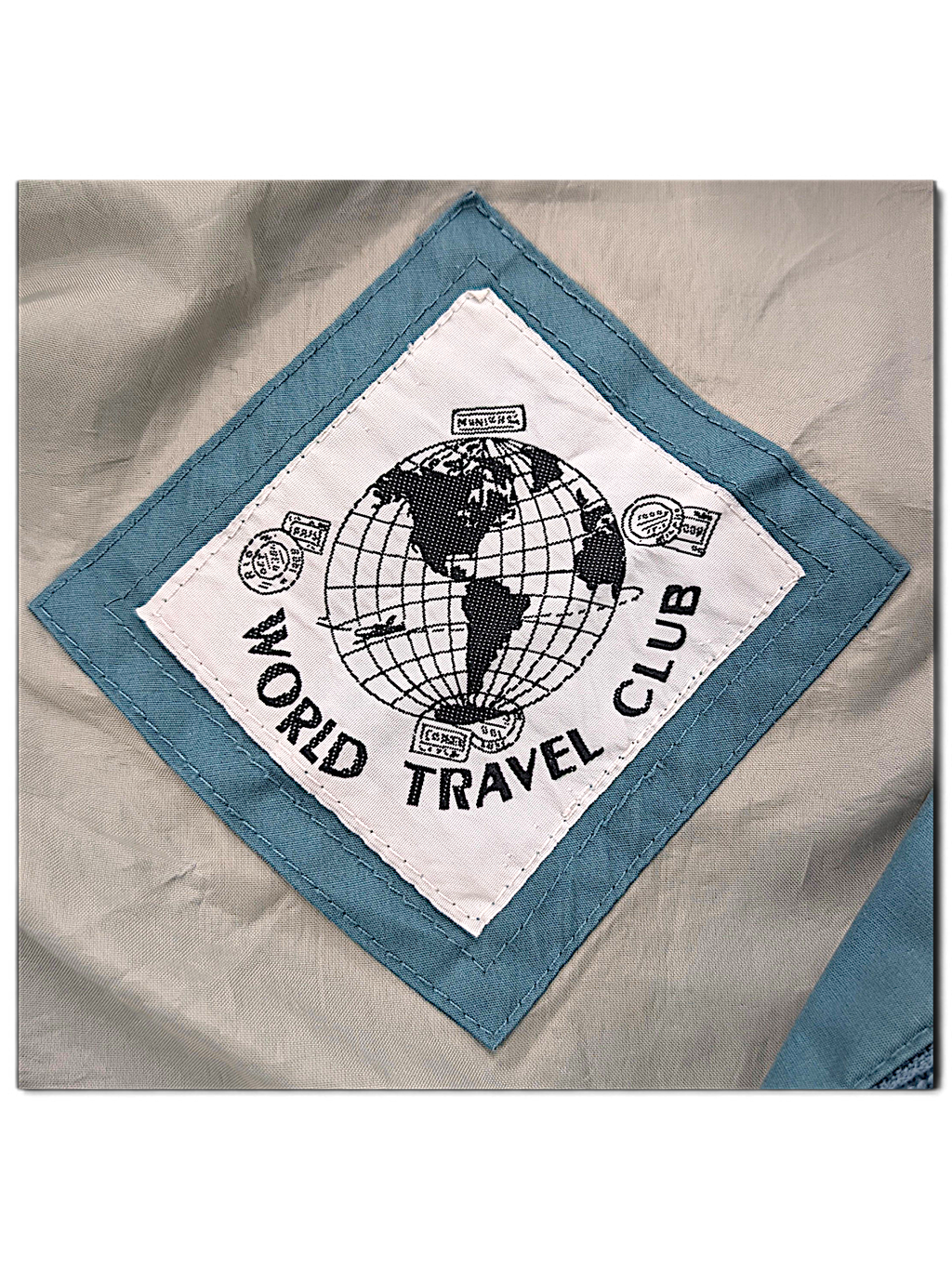 World Travel Club Light Blue Epaulette Jacket – L; detail view showing fabric, construction, label or condition (image 4 of 5).