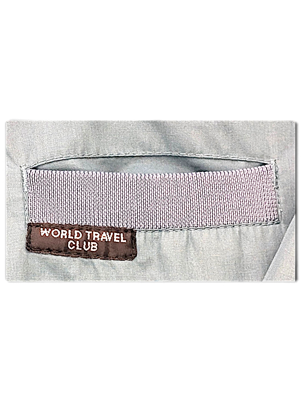 World Travel Club Light Blue Epaulette Jacket – L; detail view showing fabric, construction, label or condition (image 3 of 5).
