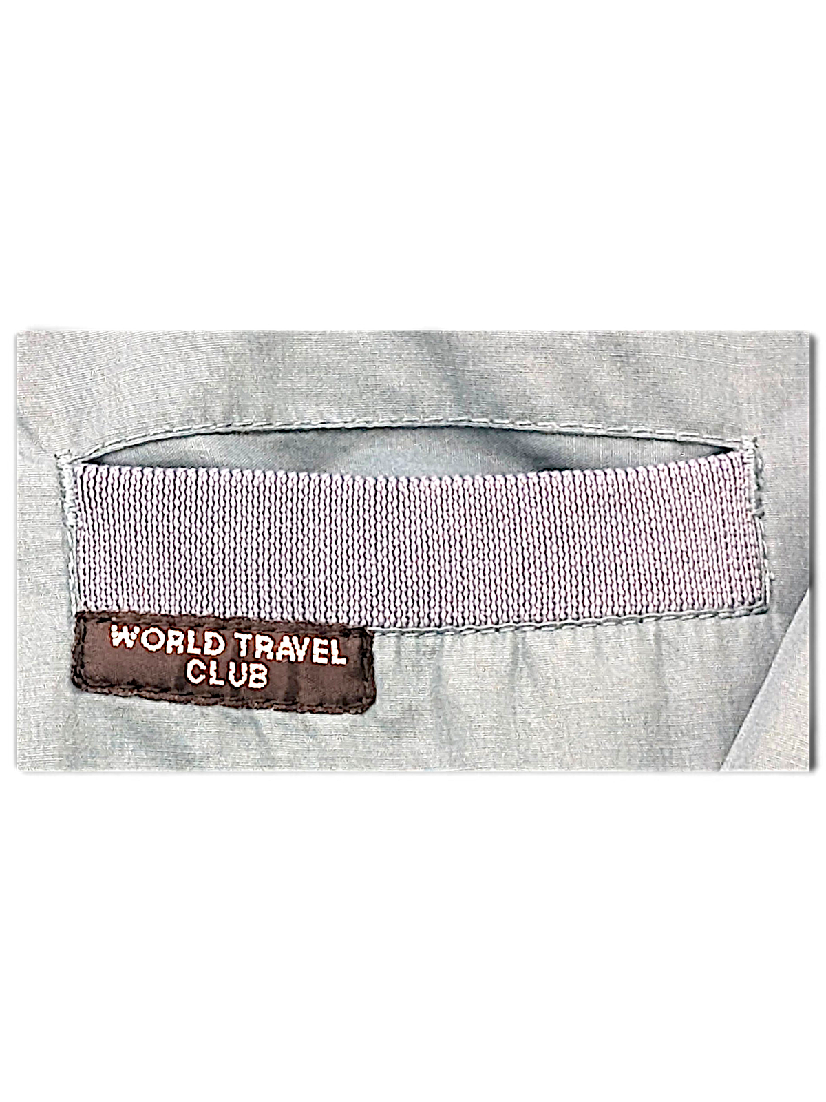 World Travel Club Light Blue Epaulette Jacket – L; detail view showing fabric, construction, label or condition (image 3 of 5).